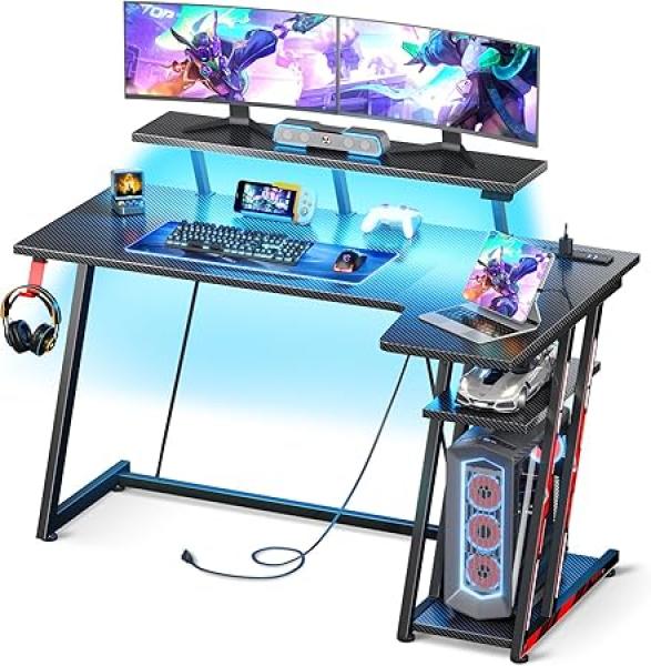 MOTPK Gaming Desk with LED Lights Power Outlets, 47 Inch L Shaped Gaming Computer Desk with Storage Shelf, Gamer Desk with Monitor Stand, PC Gaming Table with Carbon Fiber Texture, Black